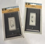 2 New Sealed Wall Plate Covers Hampton Bay Metallic Aged Bronze Steel W/screws. Fixed Price $10.00.