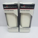 Cooper Single Pole Decorator Rocker Light Switch Almond 15A Qty. 2 #7501A. Fixed Price $9.75.
