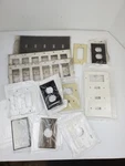 Leviton Light Switch Outlet Covers -- Mixed Lot. Fixed Price $45.00.