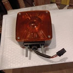 Peterson 45-17185-001 Front Turn Signal Lamp Bulb With Amber Cover. Fixed Price $20.00.