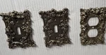 Vintage Amer Tack Lot Of 3-2SWITCH PLATE/1 Double Outlet Cover Brass Tone Ornate. Fixed Price $33.00.