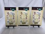 3 Vintage American Tack Wall Plates, Plastic, Floral, Hardware Included. Fixed Price $25.00.