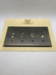 Baldwin Brass Hardware 4772-050 Satin W/black Quad Toggle Switch Plate. Fixed Price $14.99.