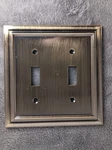 Amerelle Decor Continental Brushed Brass 2 Toggle 94TTBB Switch Plate No Screws. Fixed Price $8.97.