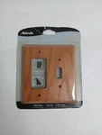 Amerelle Solid Oak Single Toggle/rocker Wall Plate, Light 901TRL. Fixed Price $11.00.